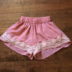 Fashion Web silky shorts with bead designs.